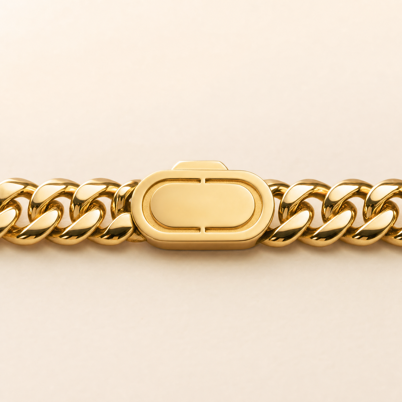 The chain coiled on a dark ground, links catching the light