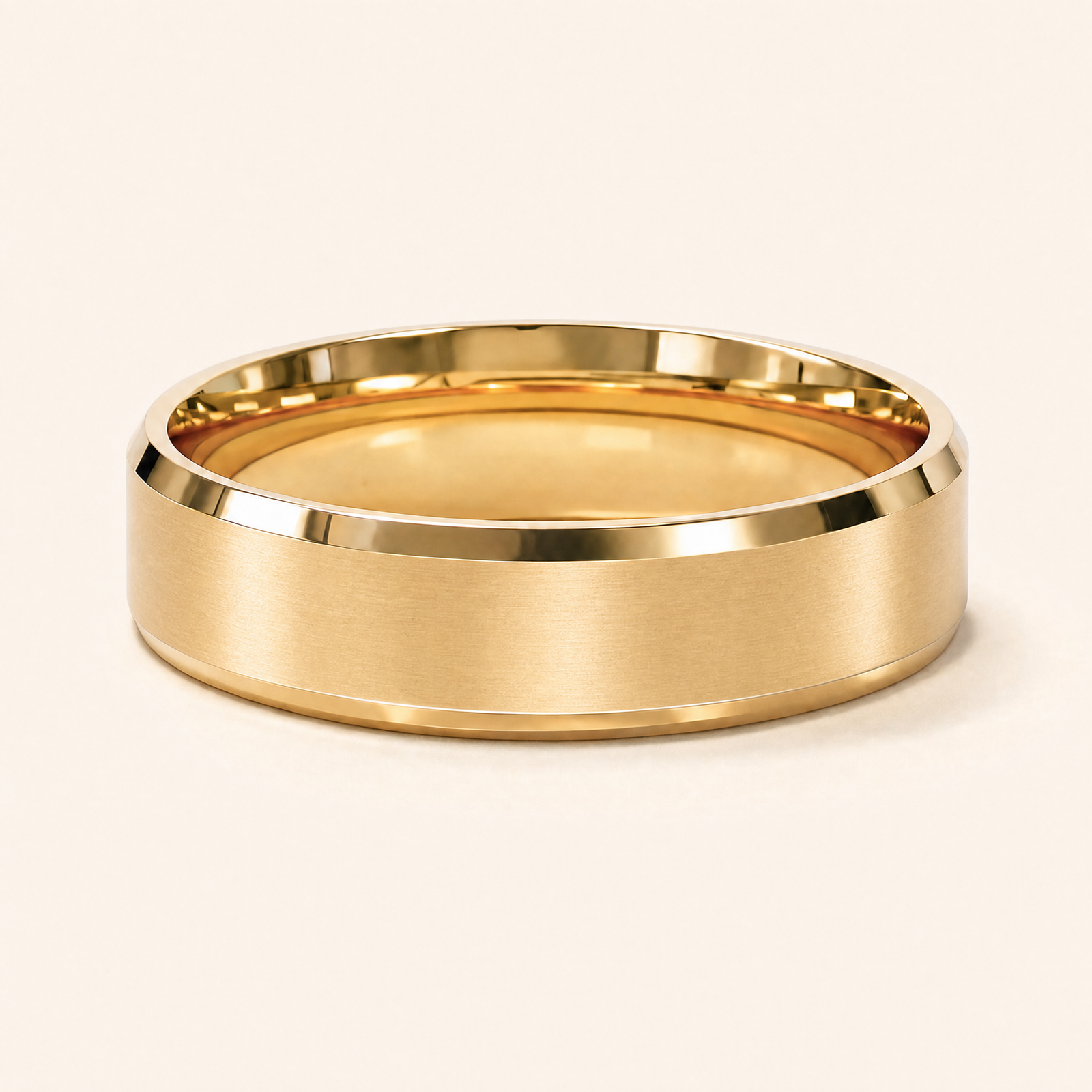 Gold · Matte — men's 5mm beveled matte brushed gold wedding band, close-up of the band's beveled edge and finish