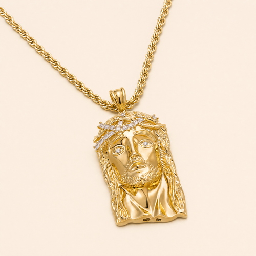 Gold Jesus pendant with moissanite crown on a rope chain, seamless ivory