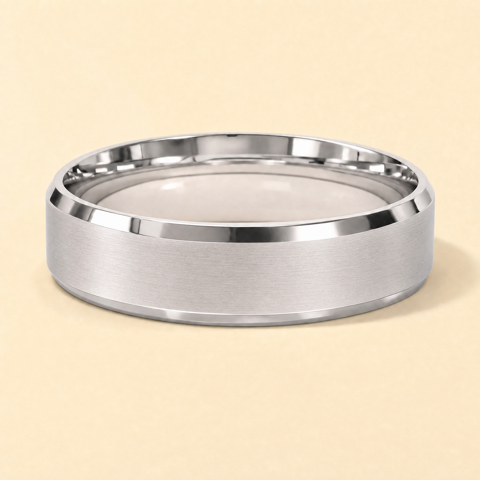 Silver · Matte — men's 5mm beveled matte brushed silver wedding band, close-up of the band's beveled edge and finish